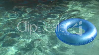 Inner Tube Floating in a Swimming Pool