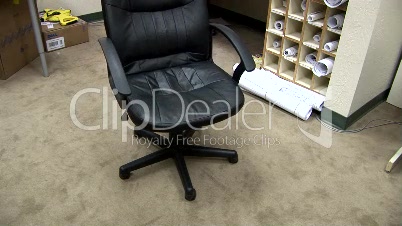 Empty Chair Spinning in Office