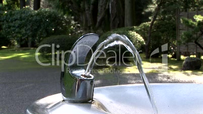 Water Flowing from Drinking Fountain