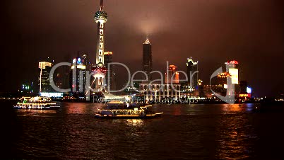 Brightly lit ship passing Shanghai, Pudong