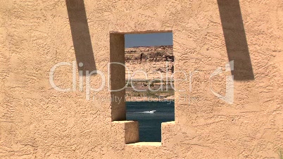 Lake Powell and boat through a window