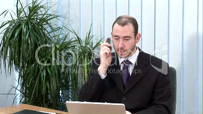Businessman Talking on Headset