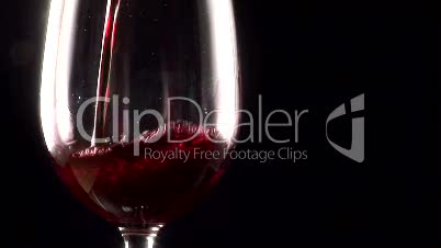 Stock Footage  - Pouring a glass of red Wine