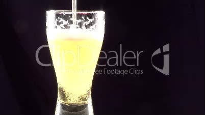 Stock Footage  - Pouring Beer Into a Glass