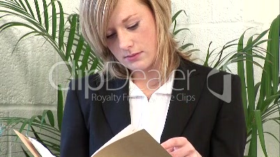 Business woman examining a Document