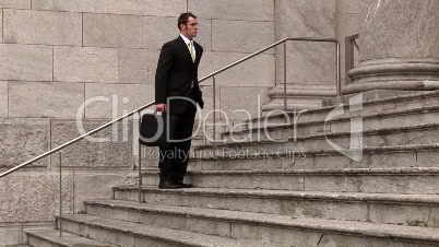 Man on Steps of Building