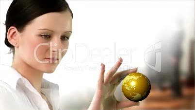 Business woman holding a Globe
