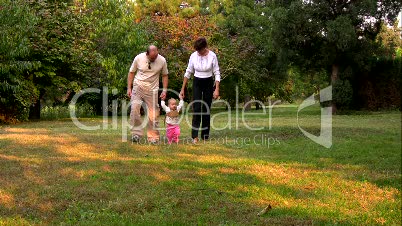 Happy family in the park 2