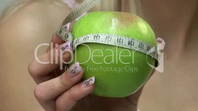 HD1080i Young blond sexy woman with green apple