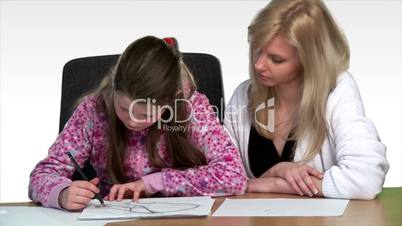 Mother heling her child with homework