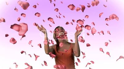 Woman catching falling roses in HD