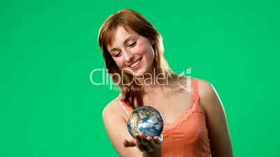 Woman Holding a Globe in her hand