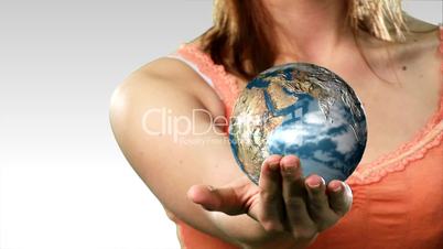 Woman Holding a Globe in her hand