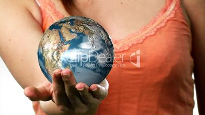 Lady Balancing a globe in her hand