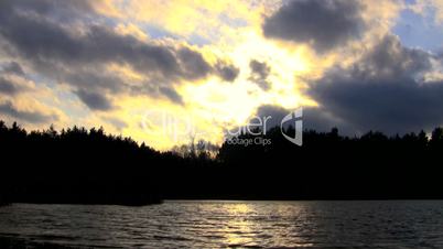 Sunset with running clouds.