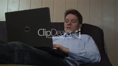 HD1080i Young man working with laptop indoor