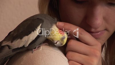 HD1080i Young woman and cockatiel