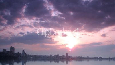 time lapse. city landscape on sunset.