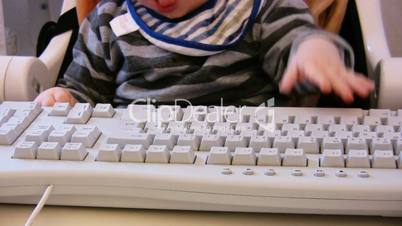 Baby typing on computer keyboard 3