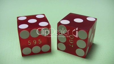 Craps - two red dice on green background