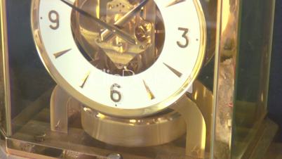 Golden clock in time lapse
