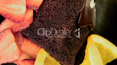 Chocolate cake and fresh fruit