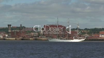 Tall ships sail up the River Mersey