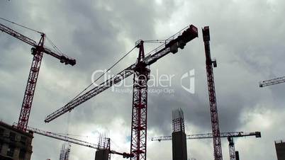 Large construction cranes timelapse