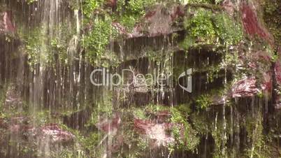 Water trickling down a rock face