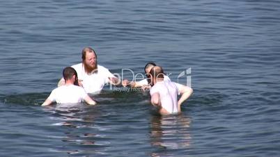 Orthodox Jews practice swimming