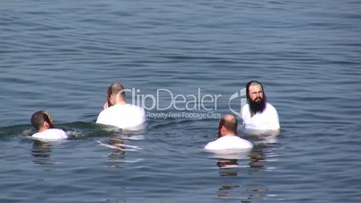 Orthodox Jews practice swimming