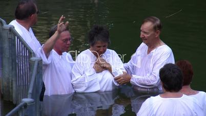Baptism of pilgrims in the Jordan River Holy Land Israel HD