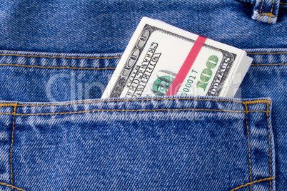 Dollars in a pocket of jeans