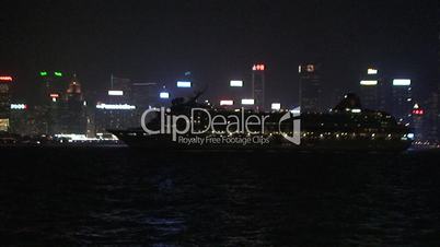 Cruise ship sails through Hong Kong at night