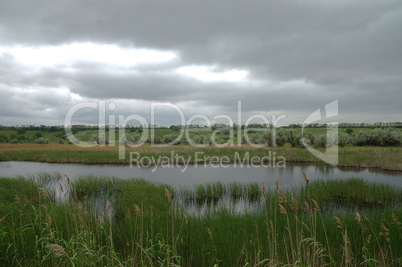 lake on background of rainy sky