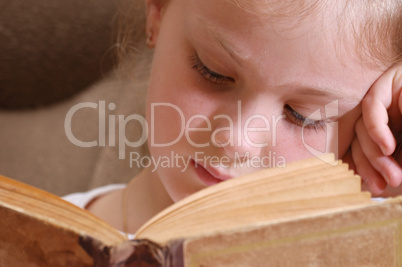 young girl and the old book.
