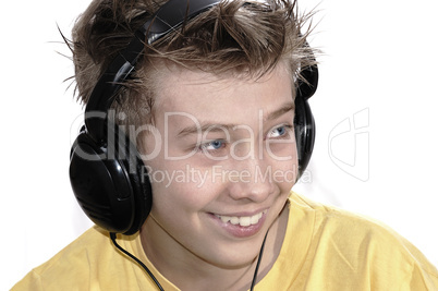 Boy listening to music with headphones.