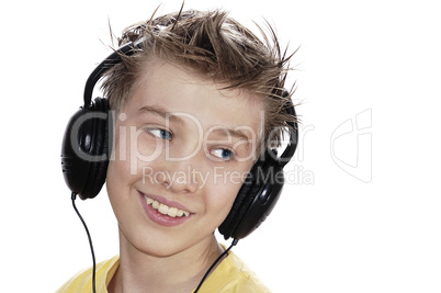 Boy listening to music with headphones.