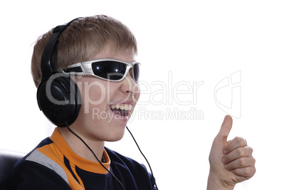 Boy listening to music with headphones.