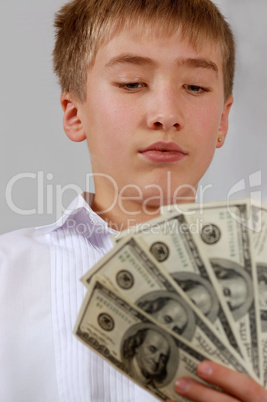 teenager looks at money