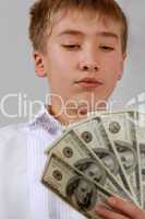 teenager looks at money