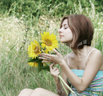 Frau mit Sonnenblumen