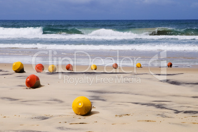 Australian beach with signal buoys