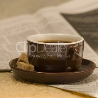 coffee mug and newspaper