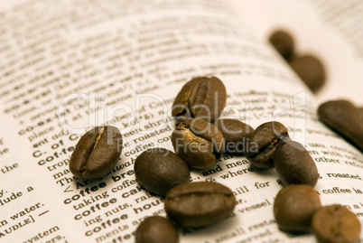 coffee beans on book