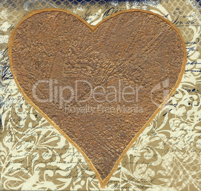 Golden heart on ornamental background