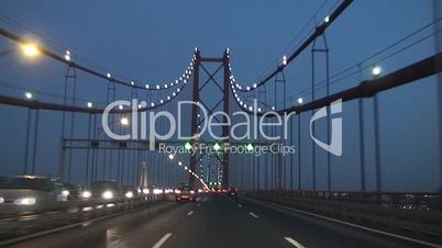 Crossing the bridge in car by night