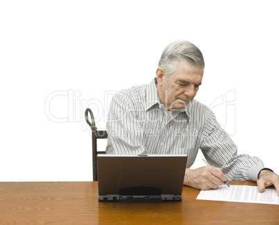 Senior writing with laptop