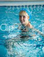 Young woman in a swimming pool.