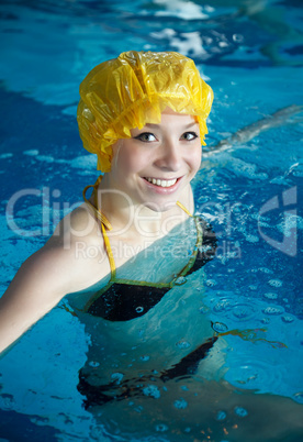 Young woman in a swimming pool.